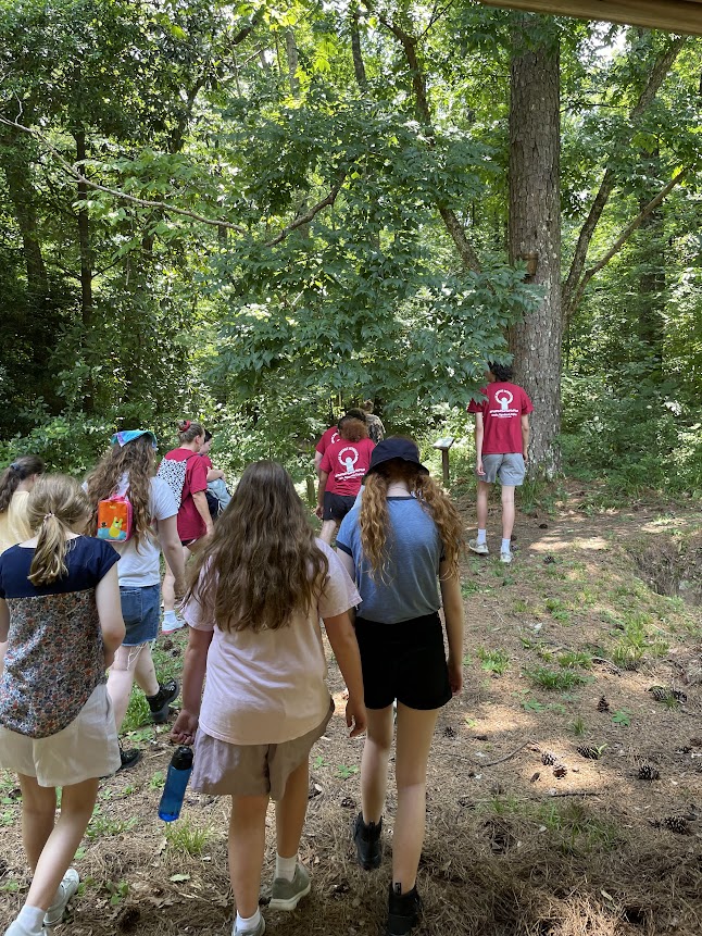 UA students leading a hike at the UA Arboretum.